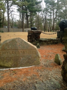 The three sided field stones, seen to the right, are still part of Myles Standish's more elaborate memorial.
